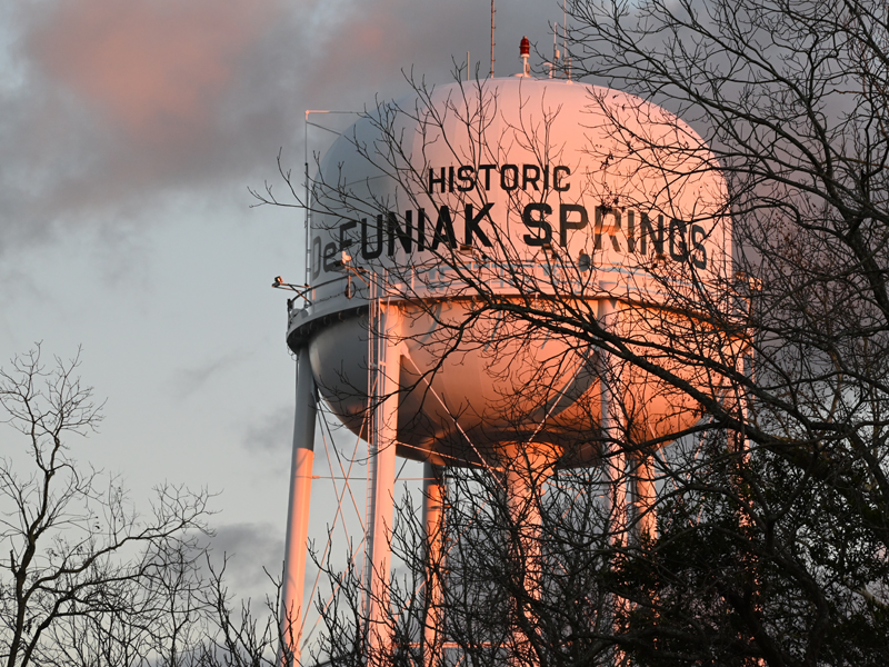 Image of water tower in Defuniak Springs at Sunset