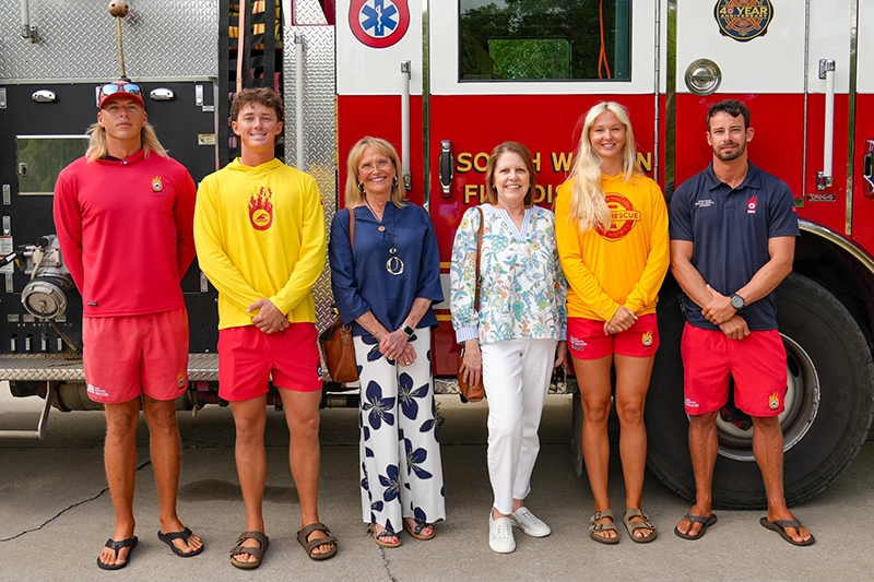 South Walton Fire District and patient family members recognize personnel involved in lifesaving care during a cardiac arrest call on 4/12/26 | Photo by SWFD